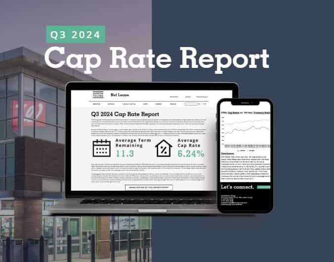 q3 2024 cap rate report displayed on laptop and mobile phone